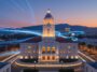A night view of the illuminated Pasadena City Hall with fast-moving blue and white light trails symbolizing the speed and coverage of Spectrum Internet Pasadena.